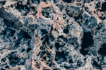 宏关闭岩石裂纹石头固体泡沫形式生多孔熔岩火山冻创建浮石古老的月球风格光黑色的灰色的陨石坑月球板岩细节纹理粮食摘要背景