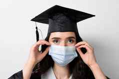 研究生女孩医疗面具冠状病毒科维德期女人主学位黑色的毕业礼服帽距离学习在线研究首页毕业大学