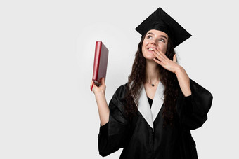 学生书毕业袍帽准备好了完成大学<strong>未来领袖</strong>科学院士年轻的女人黑色的礼服微笑
