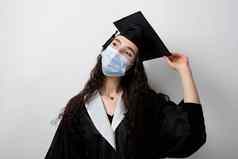 研究生女孩医疗面具冠状病毒科维德期女人主学位黑色的毕业礼服帽距离学习在线研究首页毕业大学
