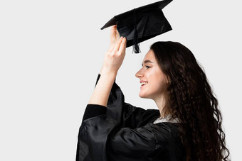 惊讶本科女孩毕业袍帽白色背景距离学习在线研究首页毕业大学