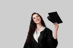 研究生女孩主学位黑色的毕业礼服帽白色背景距离学习在线研究首页毕业大学