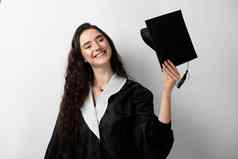 研究生女孩主学位黑色的毕业礼服帽白色背景距离学习在线研究首页毕业大学