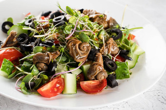 绿色<strong>沙拉</strong>蜗牛白色背景法国美食厨房