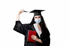 学生书毕业袍帽医疗面具冠状病毒科维德期未来领袖科学院士年轻的女人黑色的礼服微笑