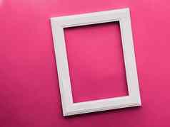 白色垂直艺术框架粉红色的背景平铺设计艺术作品打印照片专辑