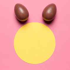 复活节鸡蛋兔子耳朵轮纸空白框架粉红色的背景