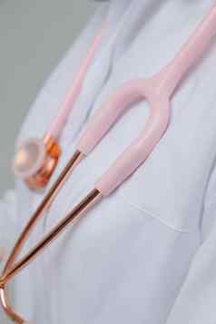 医疗听诊器粉红色的医疗听诊器医生听诊器医生持有听诊器