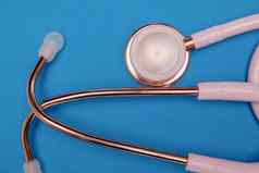 医疗听诊器粉红色的医疗听诊器概念医疗保健