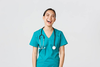 科维德医疗保健工人流感大流行概念无忧无虑的美丽的女亚洲护士实习医生风云实习生有趣的笑快乐医生午餐打破咯咯的笑会说话的同事