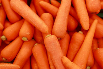 关闭食物蔬菜胡萝卜纹理背景新鲜的大橙色胡萝卜背景照片胡萝卜