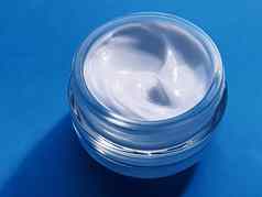 脸奶油保湿霜Jar产品样本蓝色的背景美护肤品化妆品科学