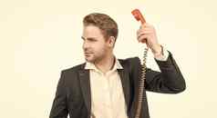 持有律师选择电话接收机专业男人。古董电话复古的连接