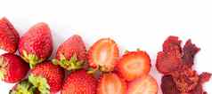 横幅健康的糖果成熟的甜蜜的草莓红色的草莓片干草莓块水果芯片健康的食物概念前视图