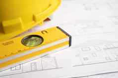 建筑房子计划项目蓝图黄色的头盔工程建设工具