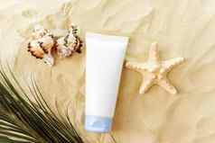 模型奶油管保湿化妆品产品塑料包海滩背景沙子产品演讲桑迪背景前视图模型