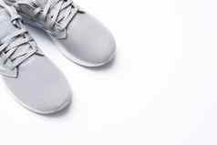 体育健康的生活方式运动鞋白色背景复制空间健身博客社会网络最小的风格