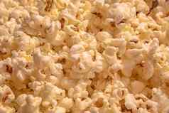 分散咸爆米花食物纹理ckground快食物受欢迎的电影电影爆米花表面
