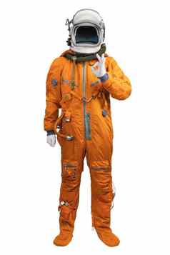 宇航员穿橙色宇航服头盔显示手标志手势孤立的白色背景