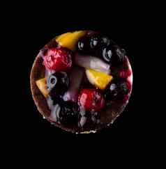 糕点塞水果浆果柑橘类水果黑色的背景隔离视图前糖果产品