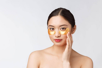 亚洲美少年女人护理皮肤黄金眼睛面具补丁眼睛