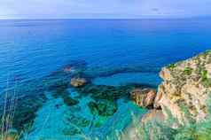 伊特鲁里亚海绿松石Azure水礁没完没了的地平线视图悬崖岩石tropea小镇