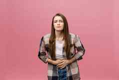 年轻的高加索人女人孤立的背景手胃消化不良痛苦的疾病感觉不舒服疼痛概念
