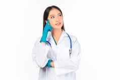 肖像亚洲女医生听诊器统一的穿外科手术手套思考统一的医生准备好了手术