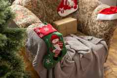 圣诞节夏娃红色的颜色装饰袜子挂圣诞节树散景光背景假期家庭快乐一年快乐圣诞节节日概念古董颜色语气效果