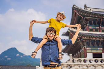 爸爸儿子游客韩国Gyeongbokgung宫<strong>理由</strong>首尔南韩国旅行韩国概念旅行孩子们概念