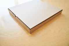空白棕色（的）纸板披萨纸盒子孤立的表格