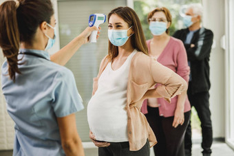 怀孕了女人温度检查科维德疫苗