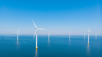 风车公园海洋无人机空中视图风车涡轮机生成绿色能源电风车孤立的海荷兰