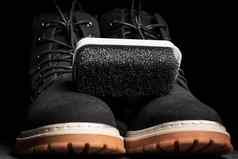 黑色的泡沫海绵仿麂皮鞋子黑色的靴子