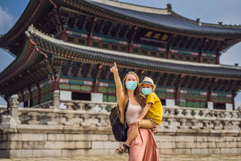 妈妈儿子游客医疗面具首尔南<strong>韩国</strong>旅行<strong>韩国</strong>概念旅行孩子们概念游客恐惧法律顾问病毒医疗戴面具的游客