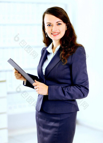 肖像可爱的年轻的业务女人工作计划微笑办公室环境