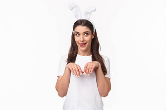 有趣的愚蠢的好玩的女孩兔子耳朵t恤舔嘴唇做白日梦美味的复活节一天模仿兔子手拉关闭胸部爪子图片