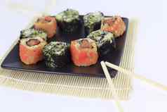 寿司集类型牧寿司筷子黑色的板