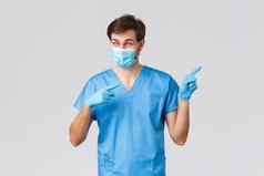 科维德医疗保健工人医院概念热情的医生医疗面具手套蓝色的护士外科医生实习医生风云指出手指显示促进广告