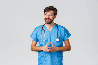 医疗保健工人冠状病毒检疫运动流感大流行概念微笑pationate医生蓝色的实习医生风云听诊器思考解释工作生病了人实习生