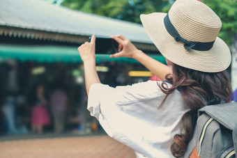 女人聪明的电话照片旅行者旅游旅行假期假期旅程旅行概念