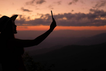 女人聪明的电话照片旅行者旅游旅行假期假期旅程旅行概念