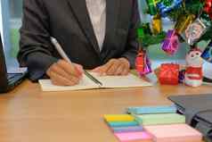 男人。写作提醒时间表请注意笔记本商人工作组织计划工作场所圣诞节一年假期