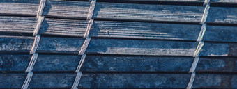 横幅编织竹子地毯粗糙的纹理脏片段横幅对角水平垂直行对比影子复制空间文本摘要背景光黑暗蓝色的灰色音调股票