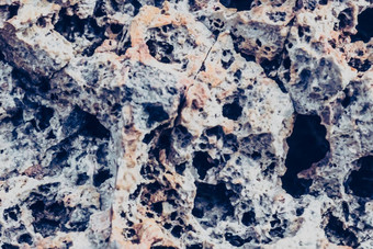 摘要自然真正的照片背景宏关闭细节干岩石裂纹石头固体泡沫形成熔岩火山浮石纹理古老的<strong>月球风格</strong>光粉红色的紫色的灰色的古董股票