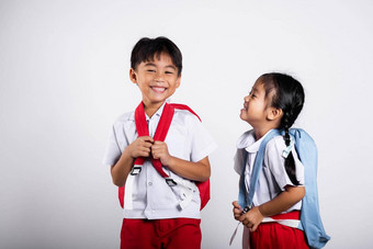 亚洲学生孩子女孩男孩<strong>小学生</strong>哥哥妹妹微笑快乐穿学生泰国统一的红色的裤子裙子