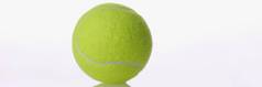 单黄色的轮网球球体育运动设备反映表面