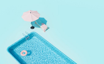 懒人阳伞在游泳池边阳光明媚的一天