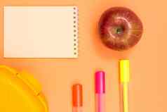 苹果笔记本颜色感觉笔午餐盒子粉红色的背景