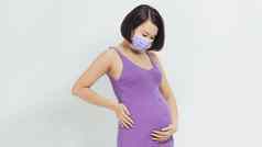 医疗保健概念亚洲怀孕了女人保护面具流感病毒白色背景